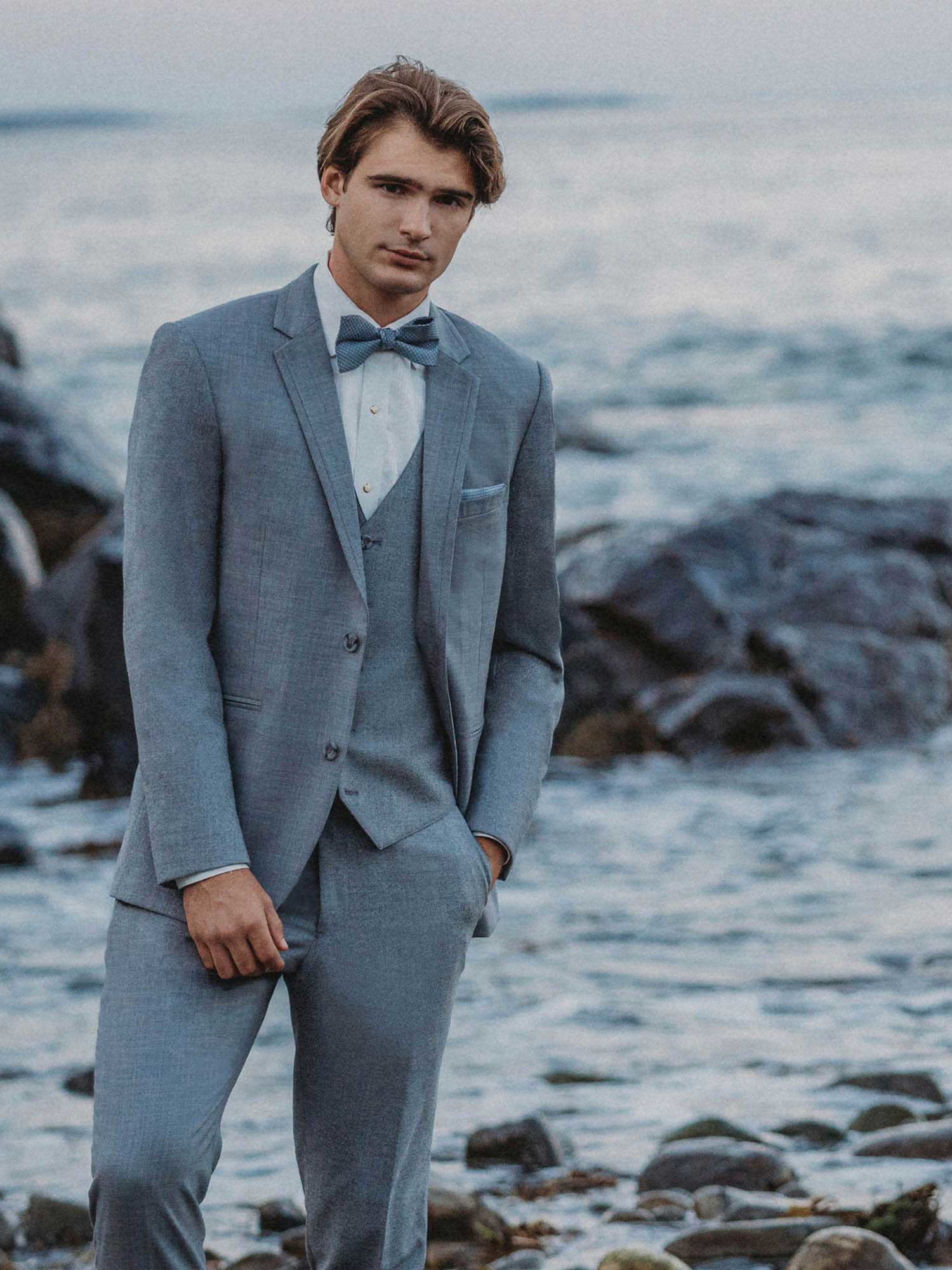 Model wearing a gray suit. Mobile image